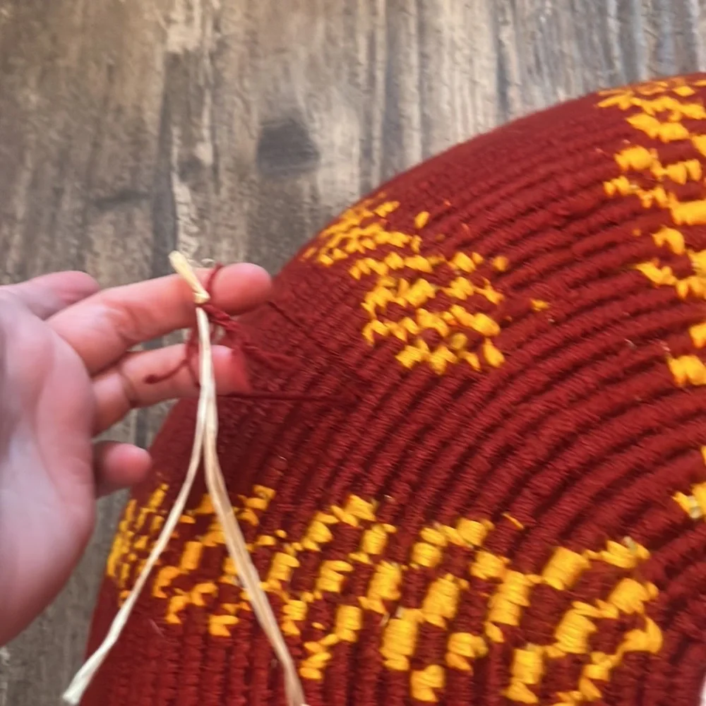 Artisan hand woven large colorful flat red/maroon and yellow basket - Picture 9 of 11